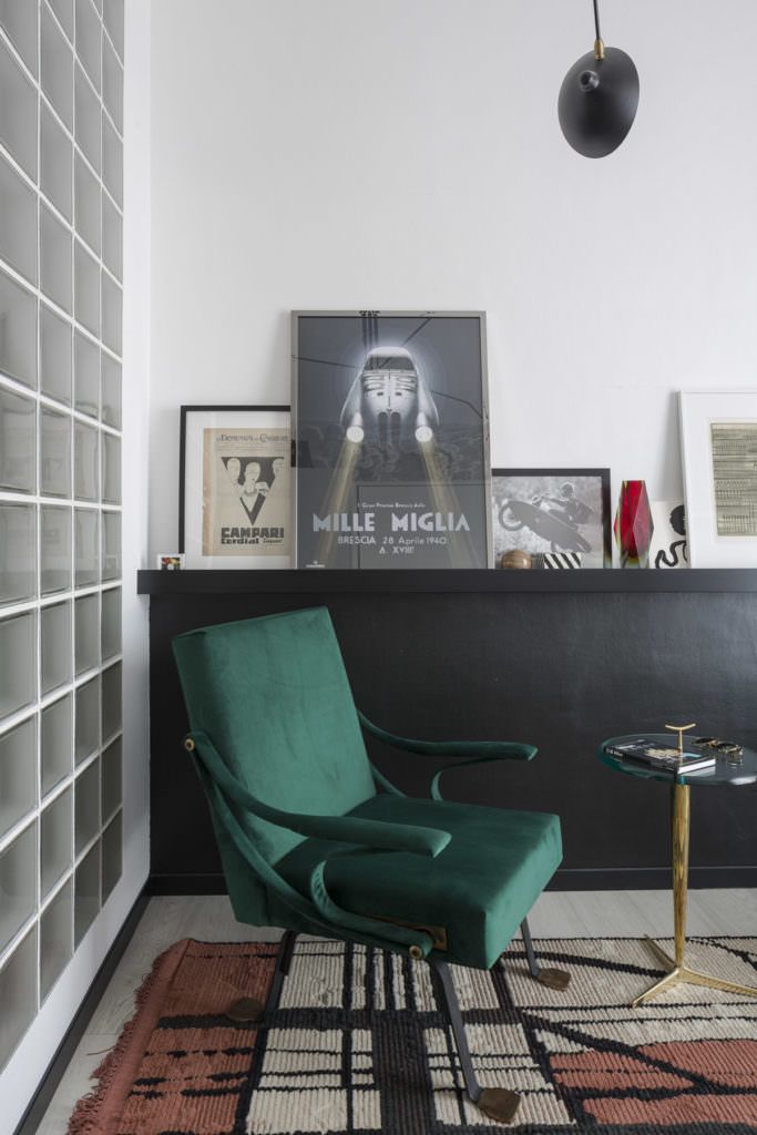 A Mille miglia print, CC tapis carpet and a Digamma armchair by Ignazio Gardella